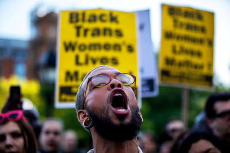 Transgender rights activists protest the recent killings of three transgender women, Muhlaysia Booker, Claire Legato, and Michelle Washington, during a rally at Washington Square Park in New York, U.S., May 24, 2019. REUTERS/Demetrius Freeman