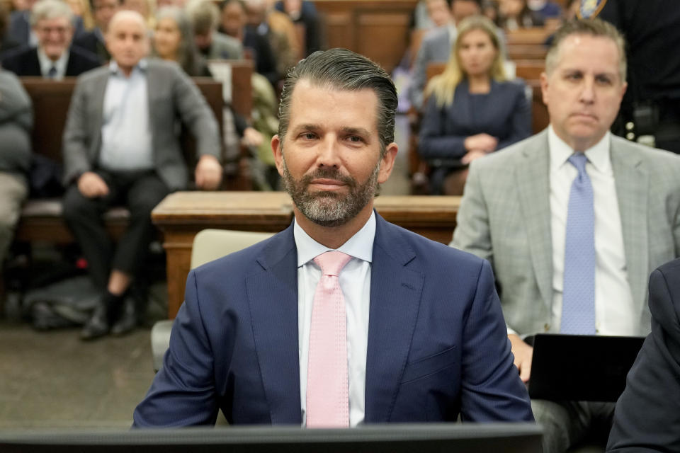 Donald Trump Jr. waits to testify in New York Supreme Court, Wednesday, Nov. 1, 2023, in New York. Donald Trump's eldest sons are set to testify in the New York civil fraud case that threatens their company's future, but a demand for daughter Ivanka's testimony is being challenged. (AP Photo/Seth Wenig)