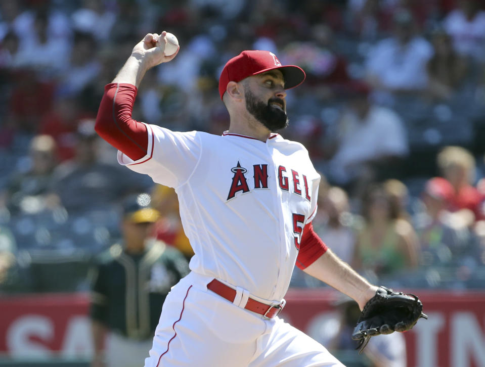 Los Angeles Angels starter Matt Shoemaker pitches to the Oakland Athletics in the first inning of a baseball game in Anaheim, Calif., Sunday, Sept. 30, 2018. (AP Photo/Reed Saxon)