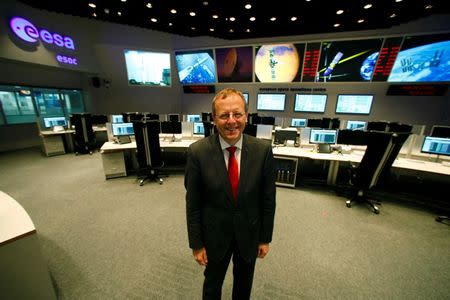 Jan Woerner, Director General of the European Space Agency (ESA) poses for a photo prior to an exclusive Reuters interview in the main control room of the European Space Operations Centre (ESOC) in Darmstadt, Germany June 17, 2016. REUTERS/Ralph Orlowski - RTX2HKKU