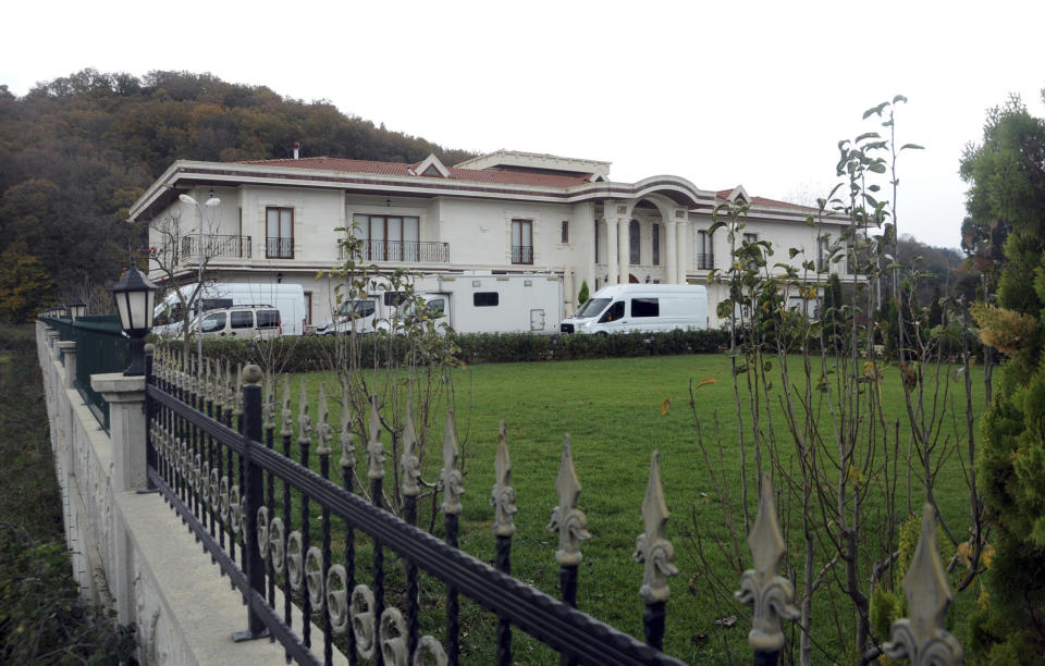 Vans are parked outside a villa during a search by Turkish police near the town of Termal, in Yalova province in northwest Turkey, Monday, Nov. 26, 2018. Turkish police, aided by sniffer dogs, searched two adjoining villas in northwest Turkey on Monday, as part of an investigation into the killing of Saudi journalist Jamal Khashoggi, officials and news reports said. (DHA via AP)