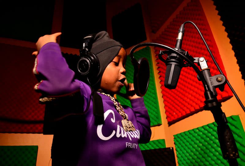 Ugandan eight-year-old rapper "Fresh Kid", whose real name is Patrick Ssenyonjo, records his music at the Badman Records studios in Kawempe Lugoba, in the outskirts of Kampala