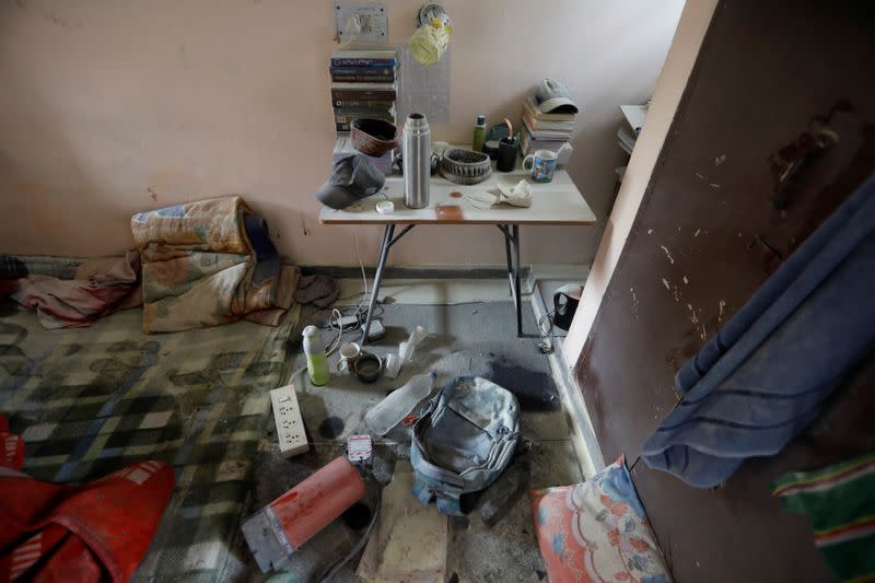 Damaged belongings of students of Jawaharlal Nehru University (JNU) are seen at a hostel room after it was attacked by a mob on Sunday, in New Delhi