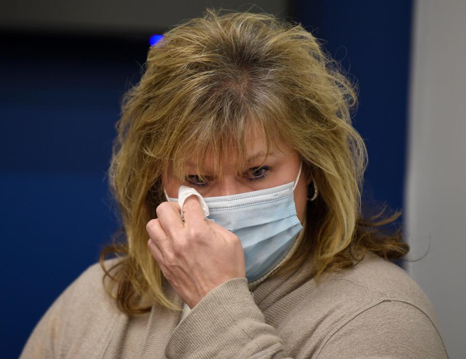 Diane Kaufman wipes away tears during a Metro Nashville Police Department press conference Monday, Dec. 7, 2020. Diane Kaufman is the mother of Caitlyn Kaufman, a 26-year-old ICU nurse at St. Thomas West Hospital, who was killed in a shooting on I-440 last week.