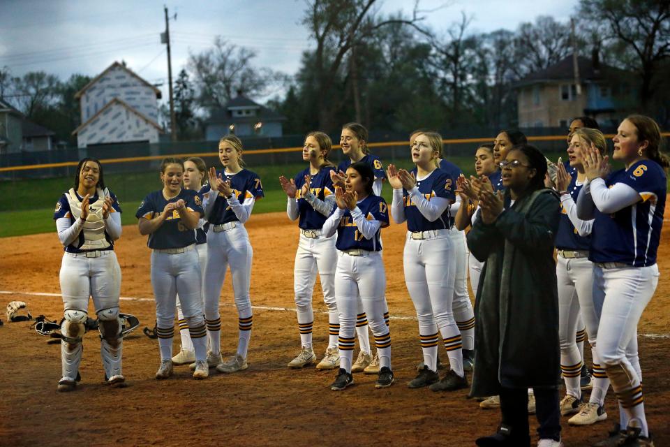 The Riley softball team sings the school fight song after beating Adams, 6-3, Wednesday, April 17, 2024, at Riley High School in South Bend.