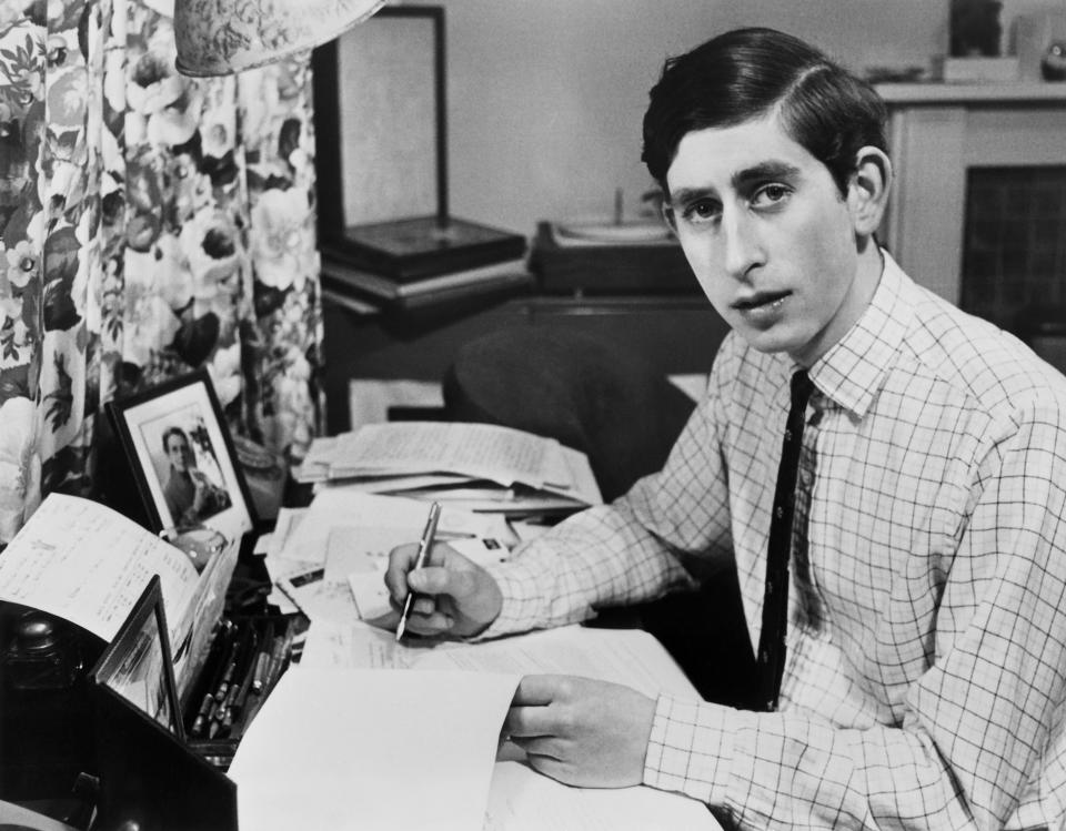 Prince Charles at his desk at Cambridge, on 19 June, 1969. Even the future king had essays to submit. (AFP via Getty Images)