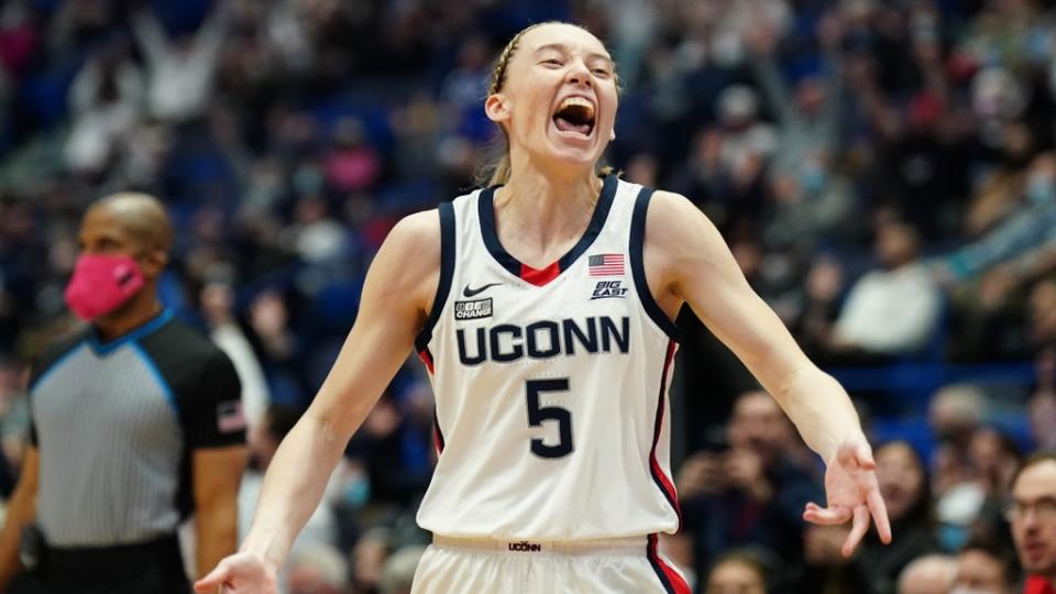 Feb 25, 2022; Hartford, Connecticut, USA; UConn Huskies guard Paige Bueckers (5) reacts after her first basket after returning to the court from a knee injury against the St. John's Red Storm in the first half at XL Center.