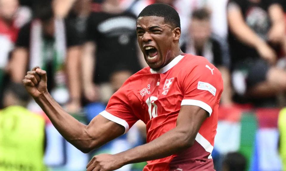 <span>Kwadwo Duah celebrates after his goal against Hungary, scored on only his second appearance for Switzerland</span><span>Photograph: Angelos Tzortzinis/AFP/Getty Images</span>