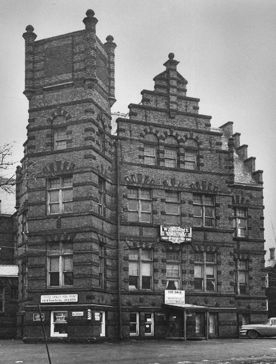 The former Werner office building, later the home of Famous Enterprises, is pictured in 1975 at Perkins and North Union streets in Akron.