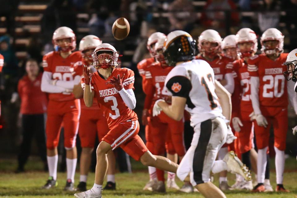 Hudson senior Kyle Areias makes a catch for big yardage during the football game against Maynard/AMSA at Hudson High School on Sep. 30, 2022.