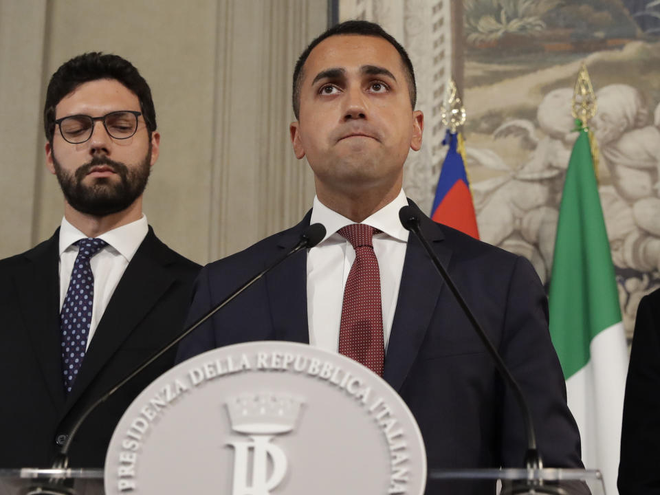 Five-Star Movement leader Luigi Di Maio talks to the press after meeting President Sergio Mattarella, in Rome, Thursday, Aug. 22, 2019. President Sergio Mattarella continued receiving political leaders Thursday, to explore if a solid majority with staying power exists in Parliament for a new government that could win the required confidence vote. (AP Photo/Alessandra Tarantino)