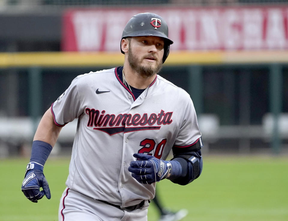 Minnesota Twins' Josh Donaldson rounds the bases after hitting a two-run home run off Chicago White Sox starting pitcher Lucas Giolito during the first inning of a baseball game Tuesday, June 29, 2021, in Chicago. (AP Photo/Charles Rex Arbogast)
