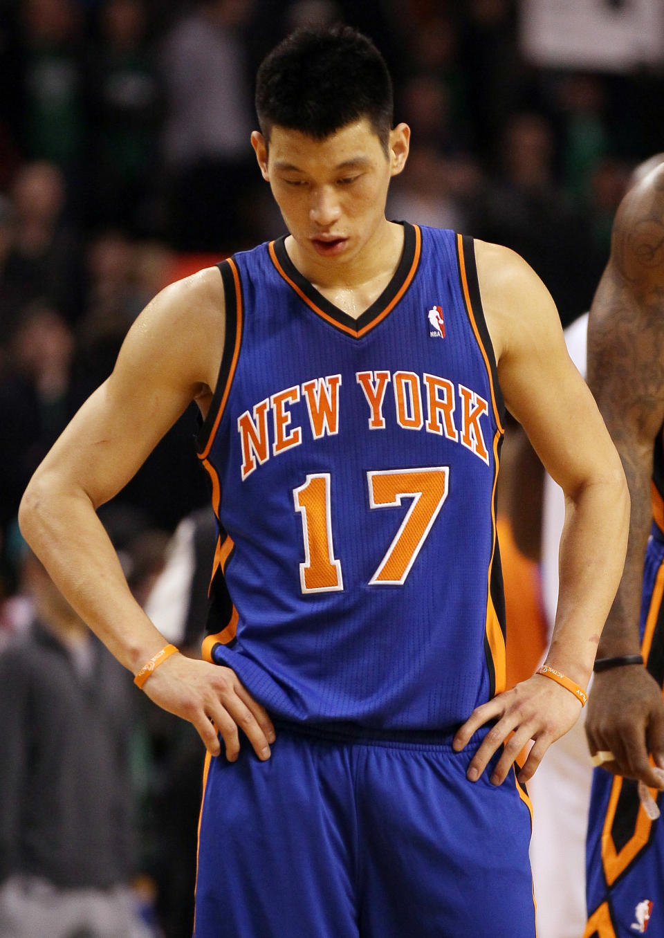 BOSTON, MA - MARCH 04: Jeremy Lin #17 of the New York Knicks reacts in the overtime period against the Boston Celtics on March 4, 2012 at TD Garden in Boston, Massachusetts. The Boston Celtics defeated the New York Knicks 115-111 in overtime. NOTE TO USER: User expressly acknowledges and agrees that, by downloading and or using this photograph, User is consenting to the terms and conditions of the Getty Images License Agreement. (Photo by Elsa/Getty Images)