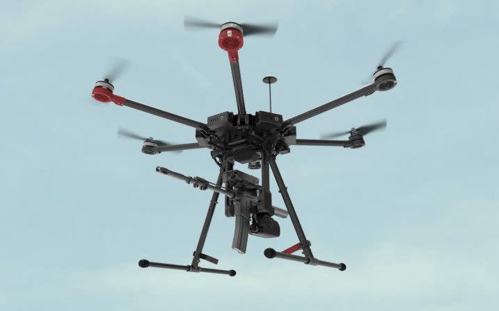 The remote-controlled quadcopters are equipped with rifles