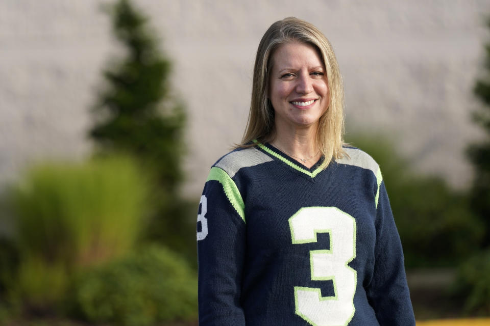 Mindi Wirth, who heads a group called Parents for Safe Schools that is seeking to overturn a sex education requirement for public schools, poses for a photo Sunday, Sept. 27, 2020, in Lynnwood, Wash. Democrats in the famously liberal state say they want to protect young people from sexual abuse, diseases and infections. But the increasingly outnumbered and aggrieved Republicans have taken issue with the content of the standards as they rally for local control. The resulting referendum on the November ballot marks the first time in the country that such a decision on sex ed will be decided by voters. (AP Photo/Elaine Thompson)