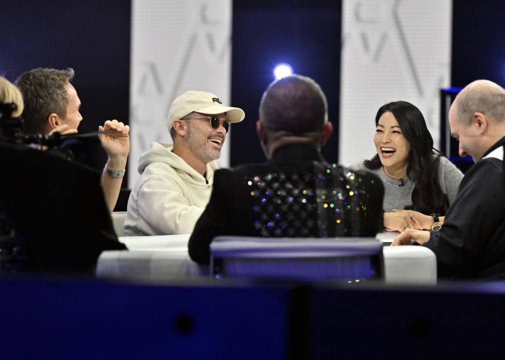 Daniel Arsham and Arden Cho playing poker.