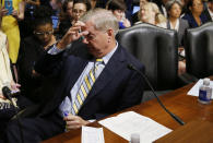 <p>Senator Lynsey Graham waits at the witness table as chanting disabled protesters are removed by Capitol Hill police before a Senate Finance Committee hearing on the Graham Cassidy bill to repeal and replace the Affordable Care Act on Capitol Hill in Washington, U.S. September 25, 2017. (Photo: Kevin Lamarque/Reuters) </p>