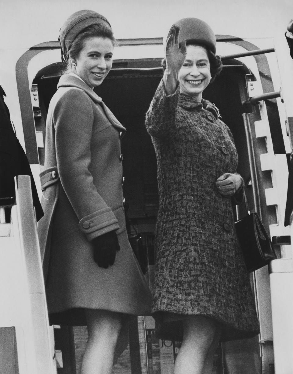 Princess Anne and Queen Elizabeth II boarding airplane at Heathrow Airport on March 2, 1970.