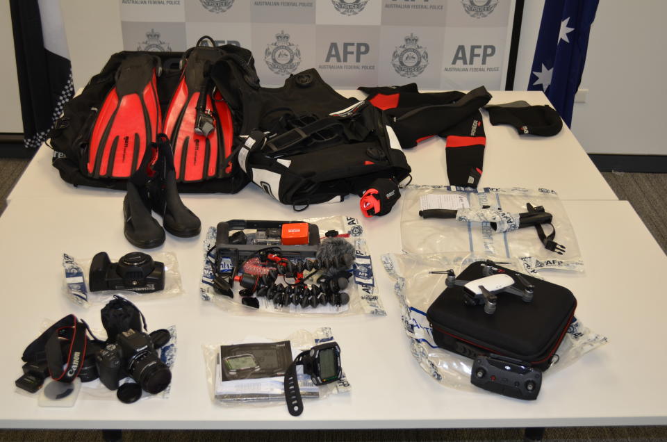 Pictured is the camera equipment and scuba gear. Source: AFP