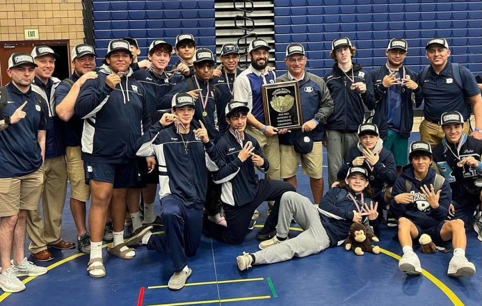 The Redwood High School boys' wrestling team are Central Section champions.