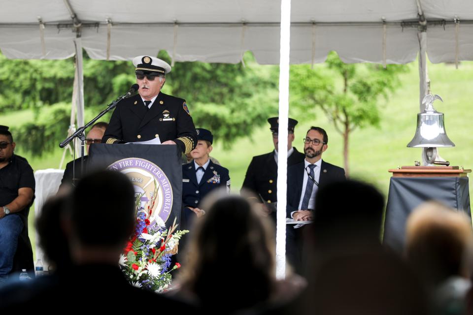 Silverton fire chief Bill Miles honors fallen Silverton firefighter, Captain Harry E. Klopfenstein, during the Fallen Firefighters Memorial Ceremony on Thursday, June 9, 2022 in Salem, Ore.