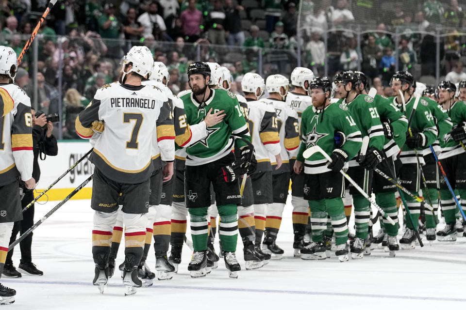 The Vegas Golden Knights and the Dallas Stars shake hands after the Golden Knights won 6-0 in Game 6 of the NHL hockey Stanley Cup Western Conference finals, Monday, May 29, 2023, in Dallas. (AP Photo/Tony Gutierrez)