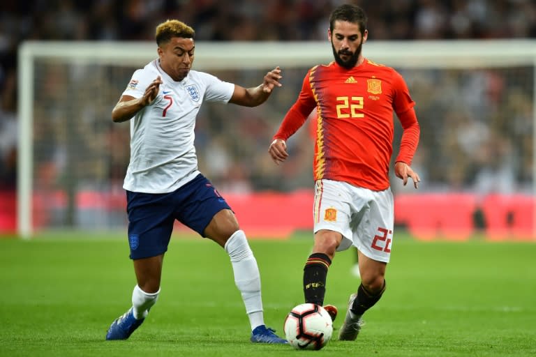 Spain's Isco shrugs off England midfielder Jesse Lingard