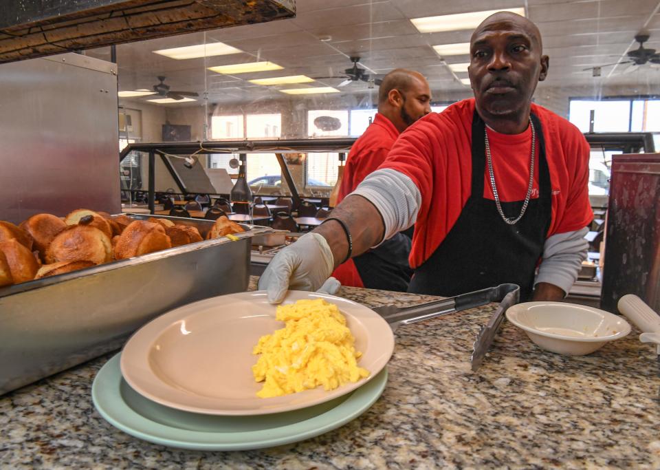 Ray Harold gets ready to serve fresh cooked eggs at OJ's Diner in Greenville, S.C. Monday, January 23, 2023.