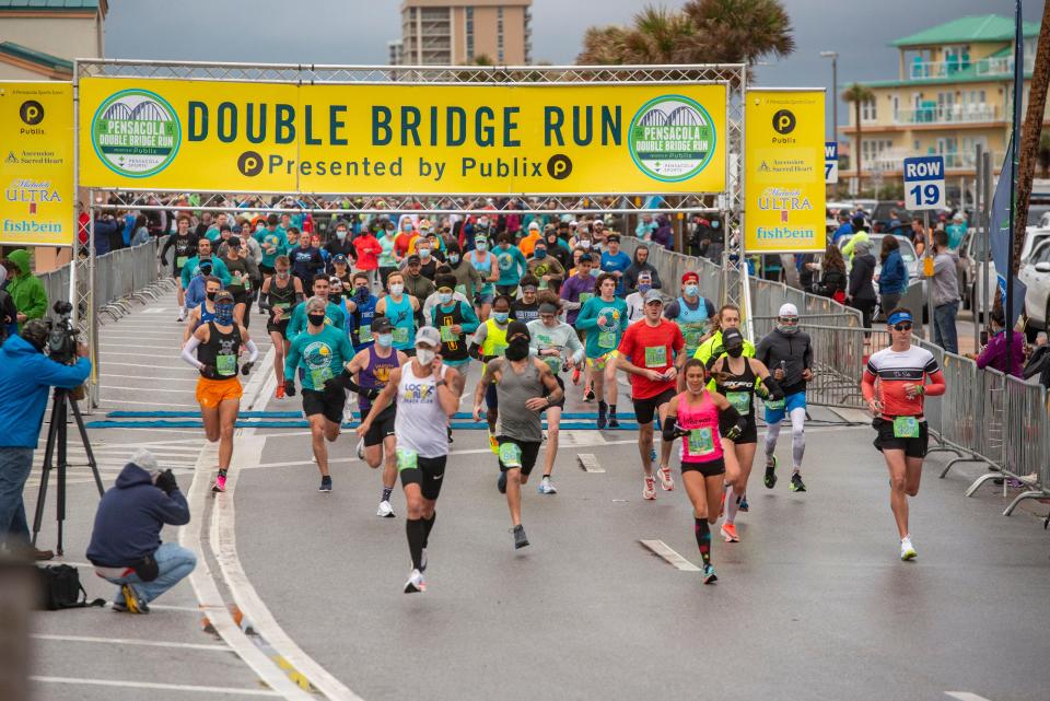 Runners take to the streets during a past Double Bridge Run.