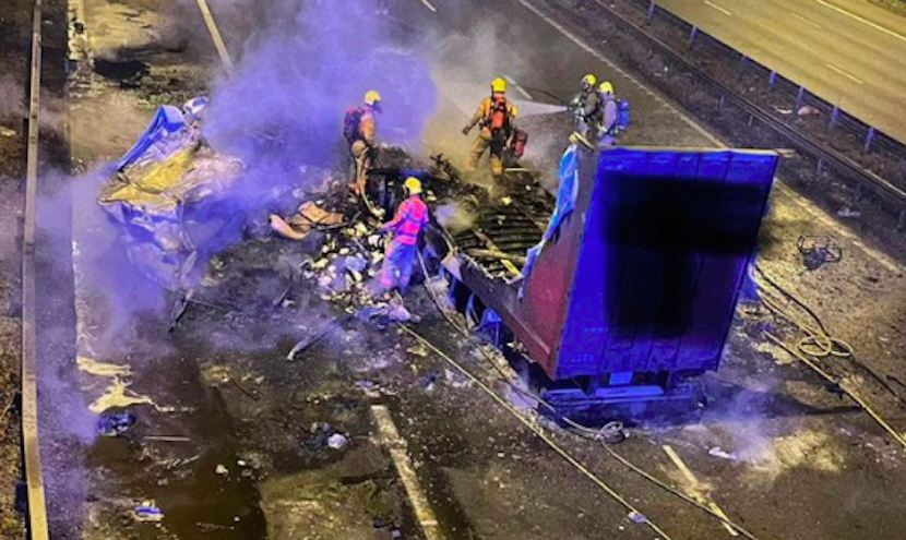 The remains of a lorry that caught fire after being blown into a bridge by high winds on the M6 motorway. (Lancashire Police)