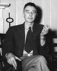 Robert Oppenheimer photographed by Ed Westcott at the Guest House in 1946. The mantle of the fireplace is original as shown in this photograph. I have placed a framed copy of this historic photograph on that mantle in the Alexander Guest House.