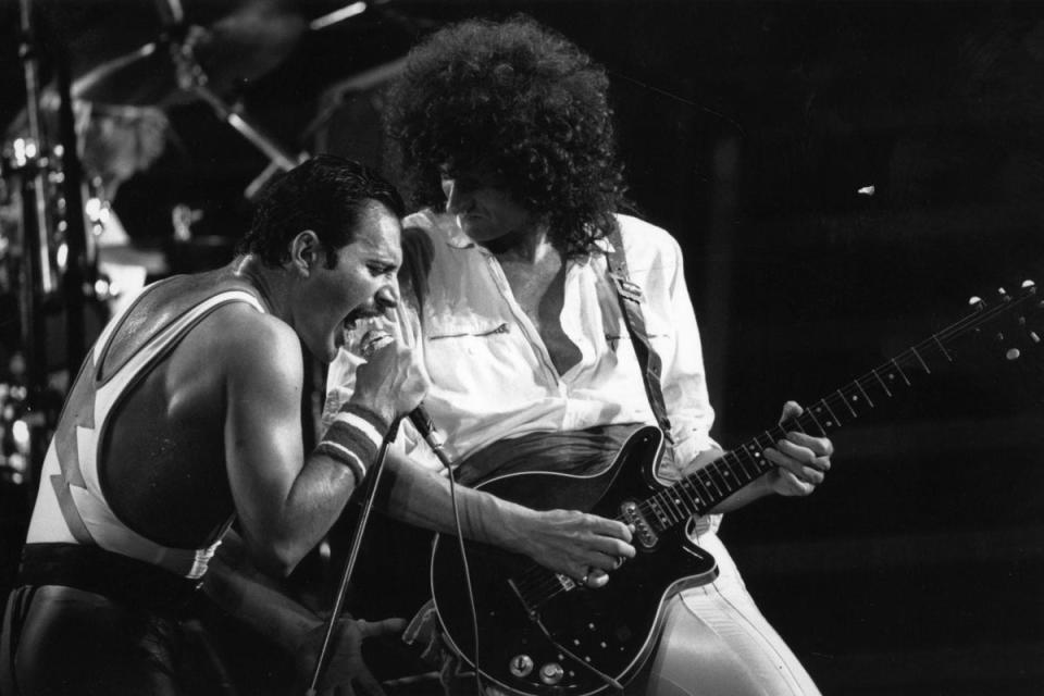 British rock group Queen in concert with singer Freddie Mercury (1984) (Getty Images)
