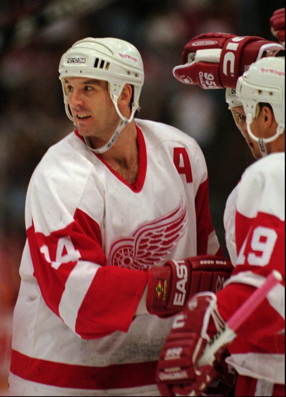 Red Wings forward Brendan Shanahan is congratulated by teammates after scoring his third goal of the evening to lead his team to a 5-2 victory over the Maple Leafs at Joe Louis Arena on Wednesday, Nov. 27, 1996.