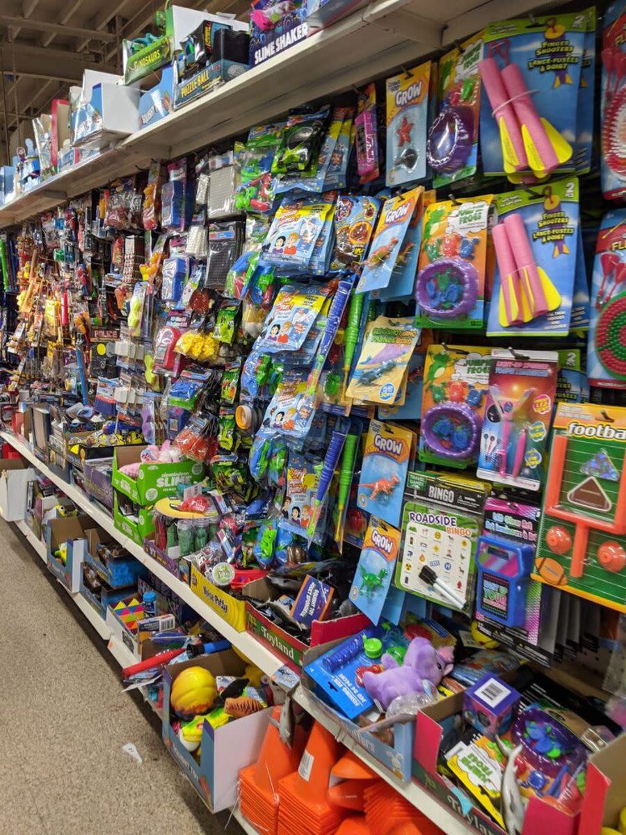 One side of toy aisle at a Dollar Tree in Concord, California, toys fill the shelves and hanging