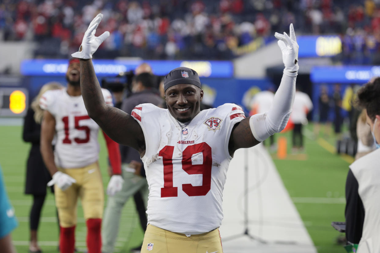 Deebo Samuel is back with the 49ers after originally requesting a trade. (Photo by Joe Scarnici/Getty Images)