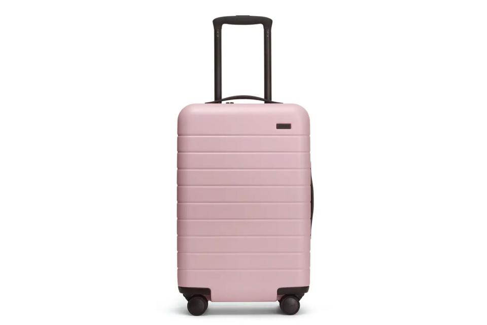 Pink hardside carry on suitcase