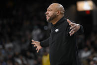 Los Angeles Lakers head coach Darvin Ham signals to players during the first half of the team's NBA basketball game against the San Antonio Spurs, Friday, Nov. 25, 2022, in San Antonio. (AP Photo/Darren Abate)