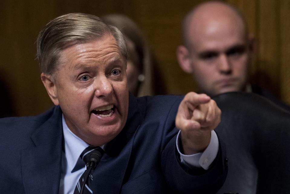 Sen. Lindsey Graham, R-S.C., points at the Democrats as he defends Judge Brett Kavanaugh during the Senate Judiciary Committee hearing on his nomination be an associate justice of the Supreme Court of the United States, on Capitol Hill September 27, 2018 in Washington, DC.