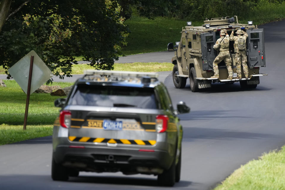 Law enforcement officers continue the search for escaped convict Danelo Cavalcante in Glenmoore, Pa., Monday, Sept. 11, 2023. (AP Photo/Matt Rourke)