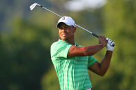 Tiger Woods hits his second shot on the 12th hole during the second round of the Greenbrier Classic at the Old White TPC on July 6, 2012 in White Sulphur Springs, West Virginia. (Photo by Hunter Martin/Getty Images)