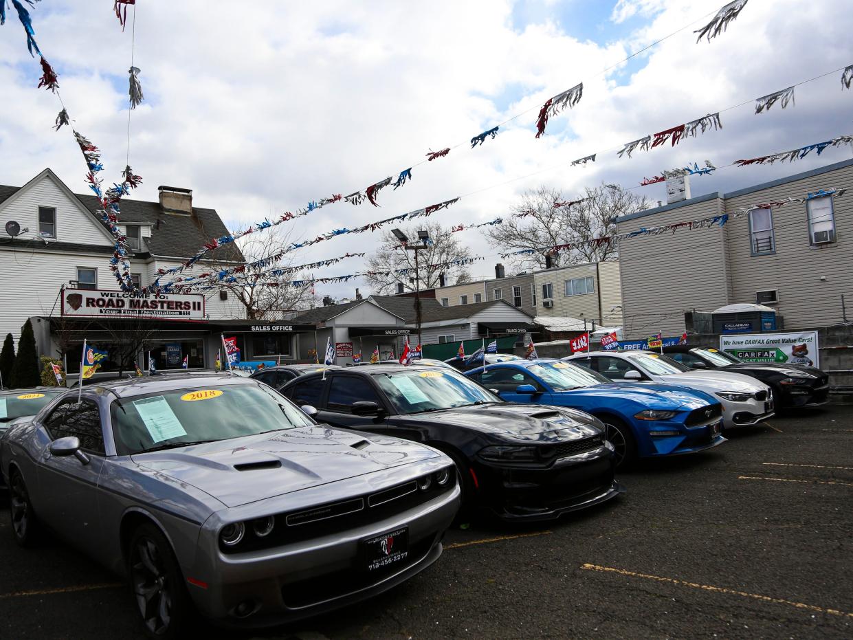 Used car lot with muscle cars