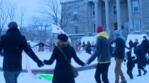 Idle No More supporters formed a circle in front of Colonial Building during a demonstration on Sunday. 