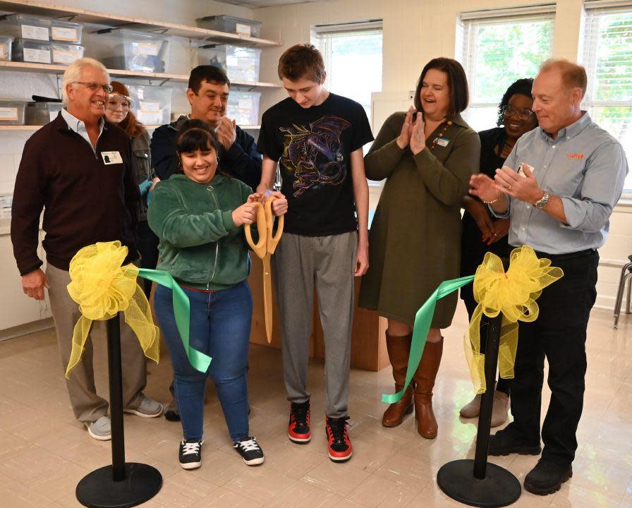 Funders and students cut the ceremonial ribbon on a new chemistry lab at S.C. School for the Deaf and the Blind in Spartanburg.