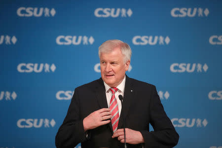 Bavarian Prime Minister and head of the Christian Social Union (CSU) Horst Seehofer arrives for a news conference at the CSU headquarters after a board meeting in Munich, Germany, November 23, 2017. REUTERS/Michael Dalder