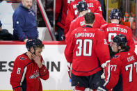 Washington Capitals left wing Alex Ovechkin (8) and right wing T.J. Oshie (77) prepare to leave the ice after Game 6 in the first round of the NHL Stanley Cup hockey playoffs against the Florida Panthers, Friday, May 13, 2022, in Washington. (AP Photo/Alex Brandon)