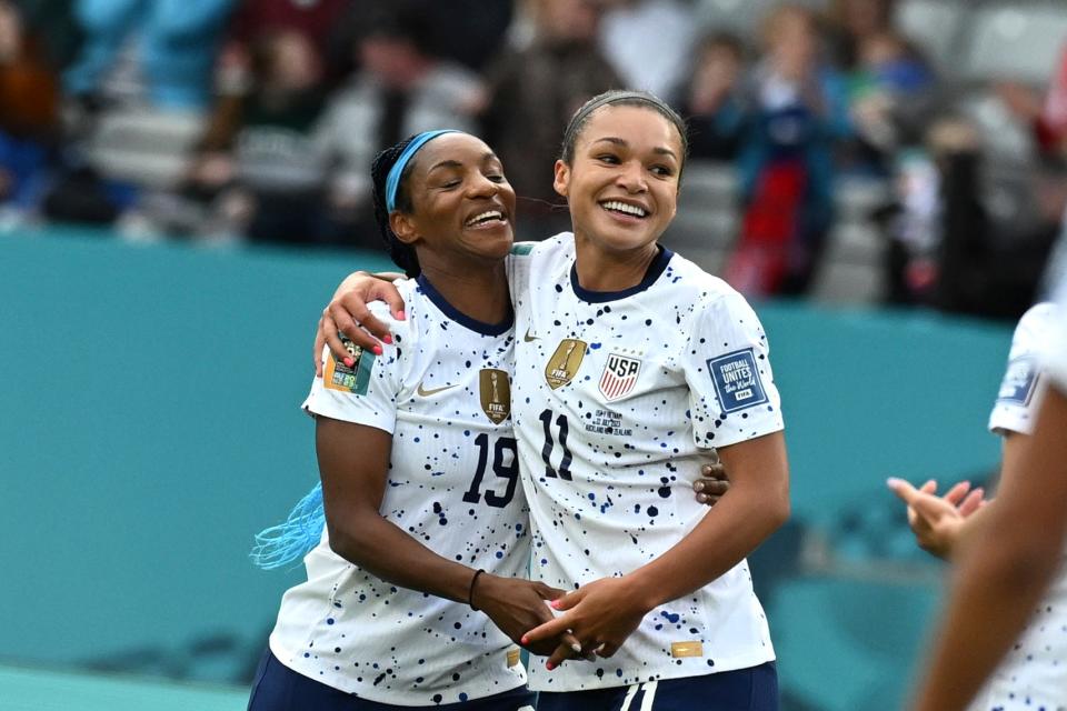 United States' Sophia Smith, right, celebrates with teammate Crystal Dunn after scoring the Americans' second goal during their World Cup match against Vietnam at Eden Park in Auckland, New Zealand on July 22, 2023.