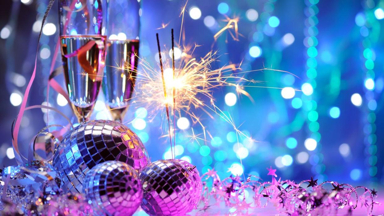 party decoration with disco balls and fire sparkler