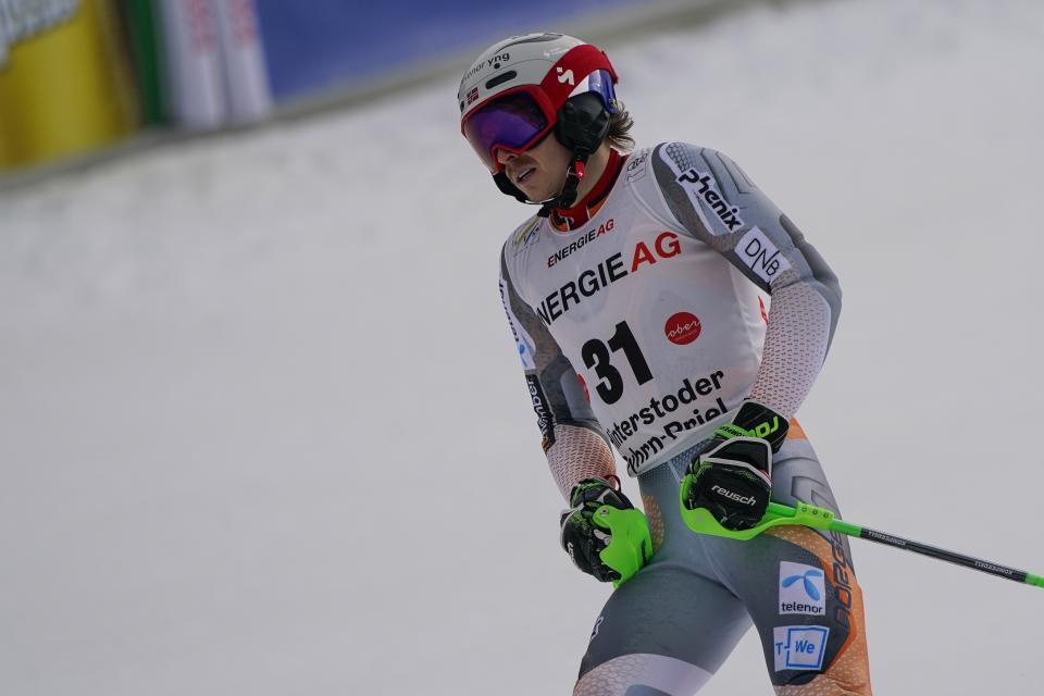Norway's Henrik Kristoffersen gets to the finish area after completing an alpine ski, men's World Cup combined, in Hinterstoder, Austria, Sunday, March 1, 2020. (AP Photo/Giovanni Auletta)