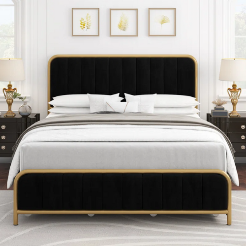 black and gold framed bed with white sheets and pillows in bedroom