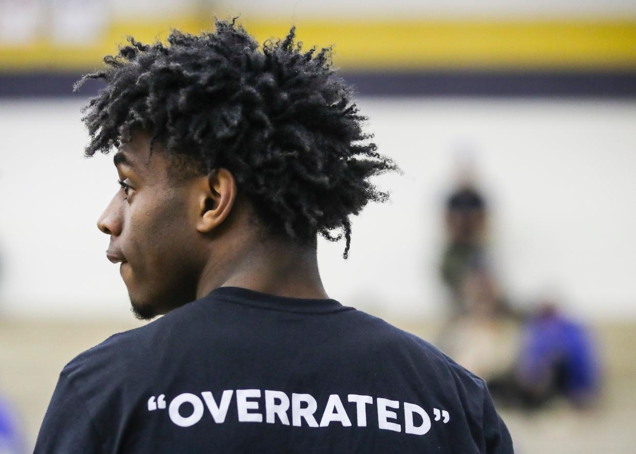 Newport players wore T-shirts with "Overrated" on the back as they warmed up before the second game Wednesday at the King of the Bluegrass tournament at Fairdale High School.